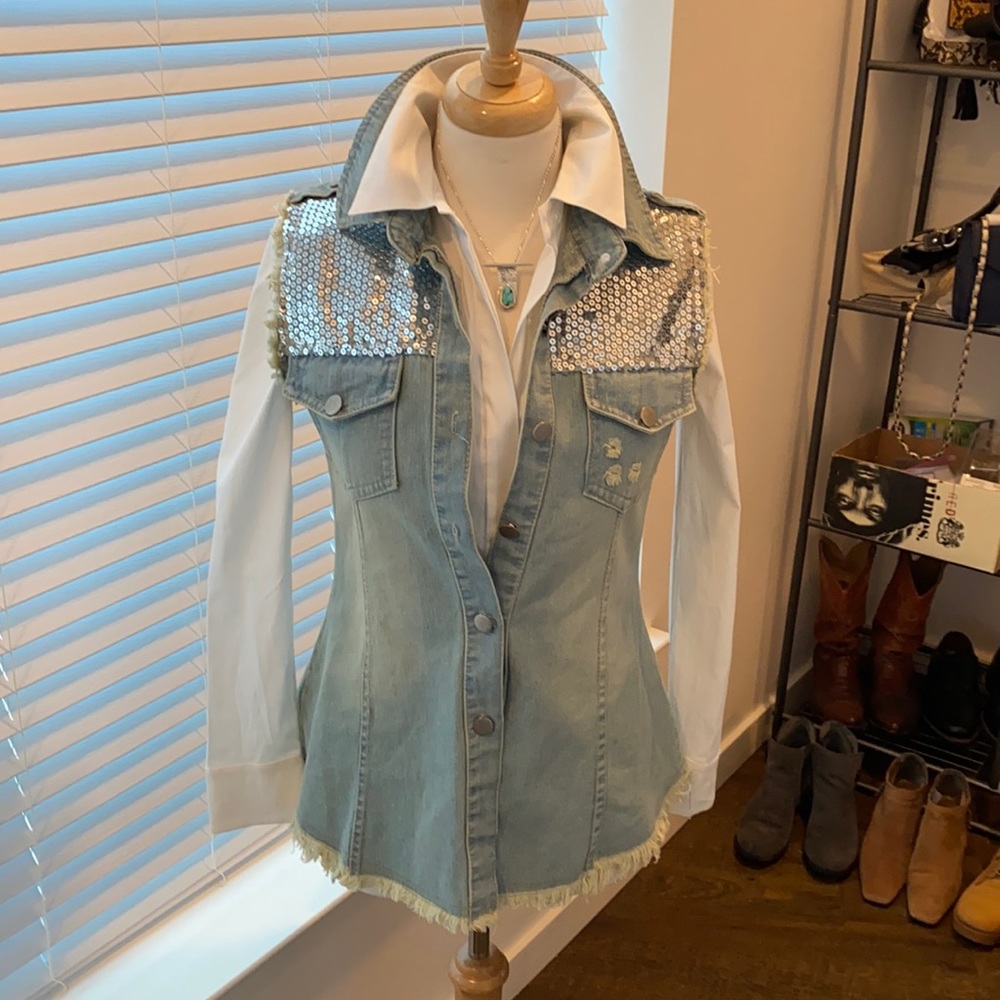 Llove distressed denim vest with sequin trim in size small
